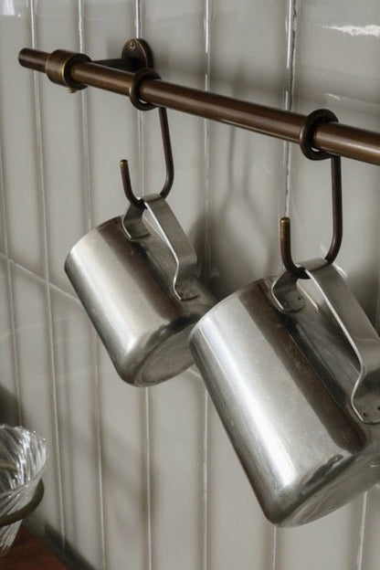 aged brass hanging pan rack